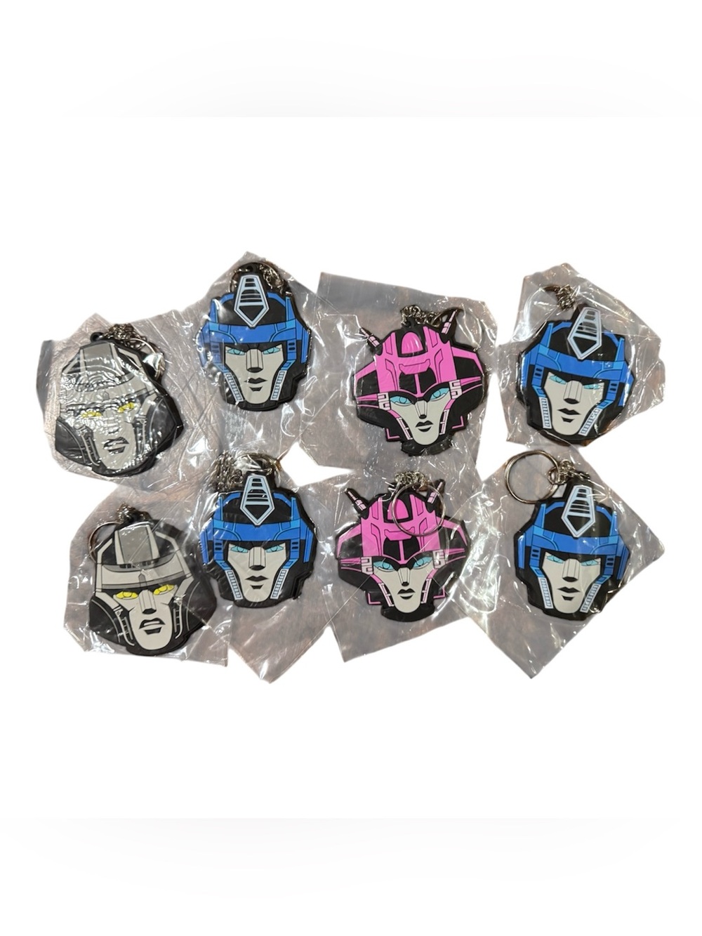 8 Transformers keychains New